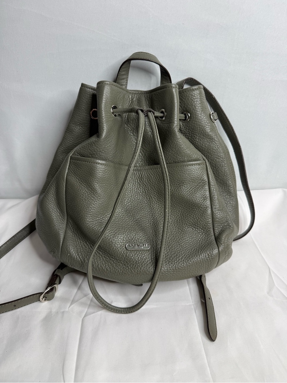 Coach leather drawstring backpack in gray-green